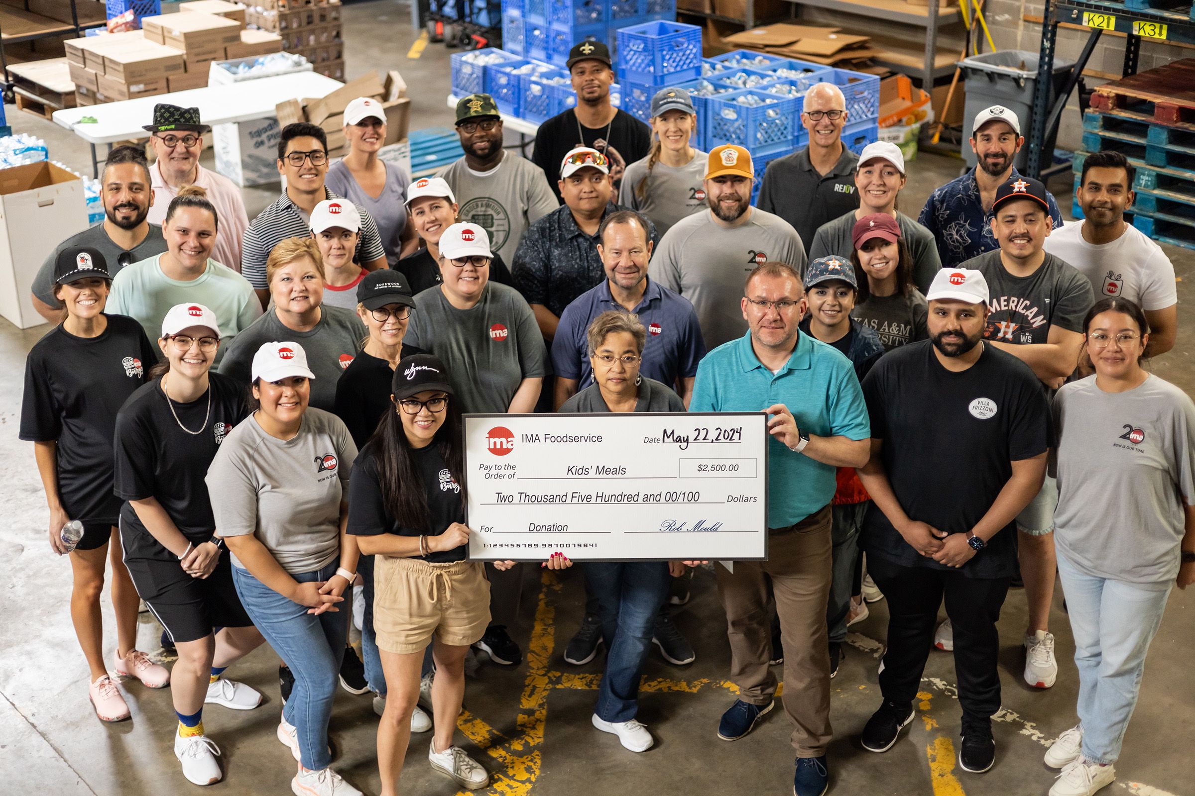 IMA Team Volunteers for Kid's Meals Following Hurricane Beryl